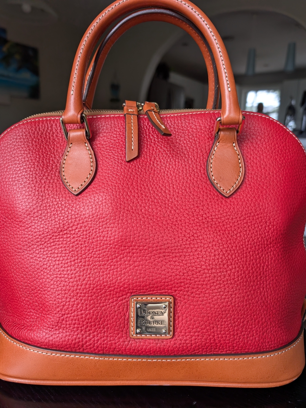 Dooney & Bourke Red Pebbled Leather Satchel with Tan Trim.Used In Great Conditio
